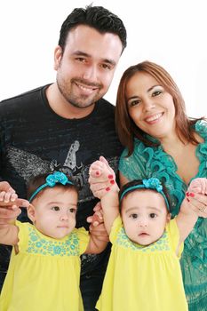 Young family with twin girls