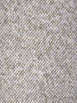 Sample piece of a Loop-woven carpet in an all-time modern light grey color tone. A useful picture for architects and people doing home decorations or a nice texture background for related subjects.