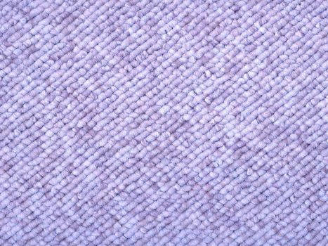 Sample piece of a Loop-woven carpet in a modern light blue, lilac color tone. A useful picture for architects and people doing home decorations or a nice texture background for related subjects.