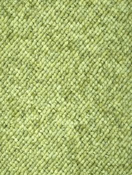 Sample piece of a Loop-woven carpet in a modern light olive green color tone. A useful picture for architects and people doing home decorations or a nice texture background for related subjects.