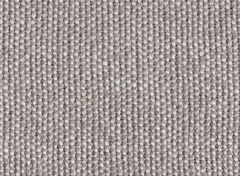 A close-up background of oldfashioned hand-woven flax linen with a rough structure in a nice grey tone.