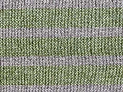 A close-up background of oldfashioned hand-woven flax linen with a rough structure and trendy green and grey stripes.