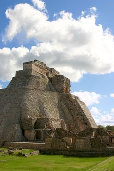 Main round pyramid on mayan site over sky