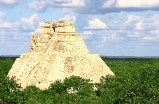 Antique mayan ruins in Mexico over green forest