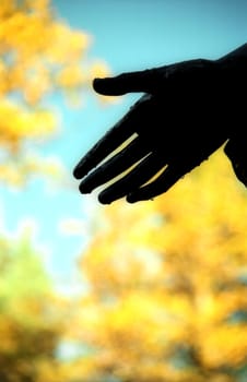 Hand of statue with rain drops 