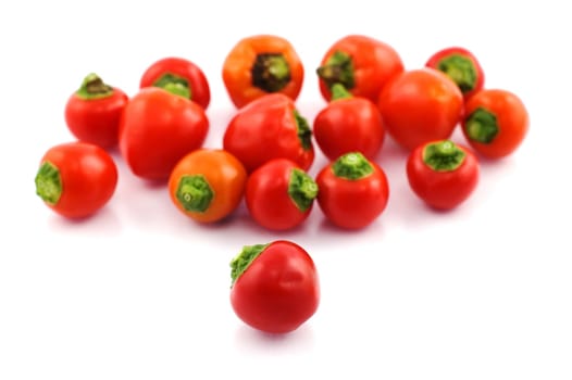 Chili peppers on white background with selective focus