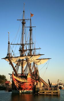 Batavia – historic galleon from Netherlands by sunset. Old ship. Lelystad, Flevoland.