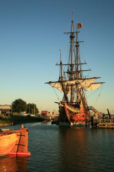 Batavia – historic galleon from Netherlands by sunset. Old ship. Lelystad, Flevoland.