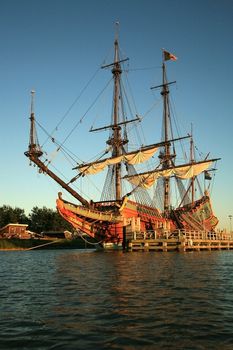 Batavia – historic galleon from Netherlands by sunset. Old ship. Lelystad, Flevoland.