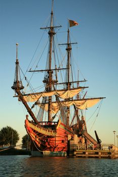 Batavia – historic galleon from Netherlands by sunset. Old ship. Lelystad, Flevoland.