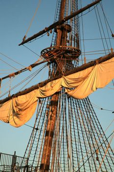 Details of sail – Batavia – historic galleon by sunset. Old ship. Flevoland, Netherlands.