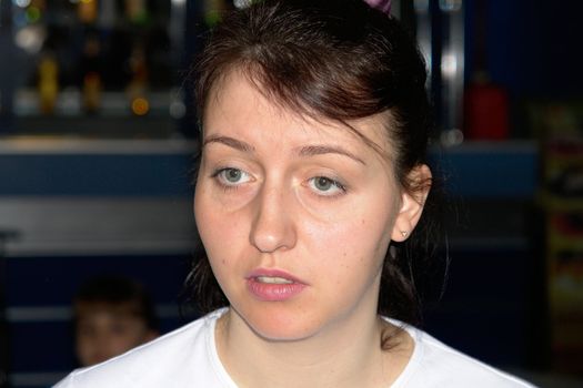 Portrait of young woman. Astonished eyes.