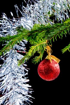 christmas tree decoration ,bright embellishment .black background