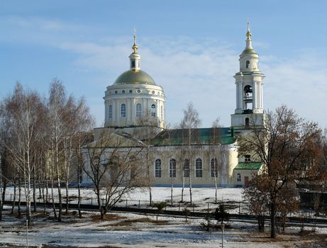 orthodox temple on the shore of river. Winter.