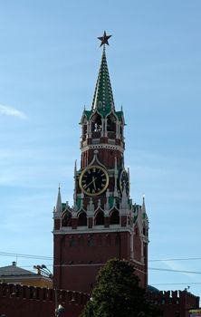 tower of the Kremlin with a clock on the Red Square in Moscow