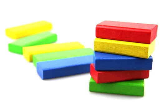 Wooden building blocks isolated on white background