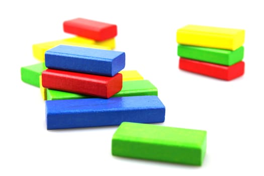 Wooden building blocks isolated on white background