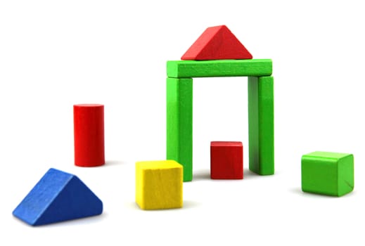 Wooden building blocks isolated on white background