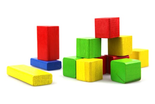 Wooden building blocks isolated on white background