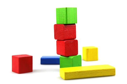 Wooden building blocks isolated on white background