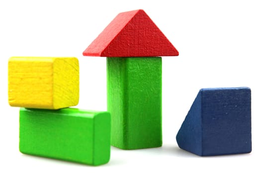 Wooden building blocks isolated on white background