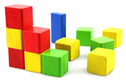 Wooden building blocks isolated on white background