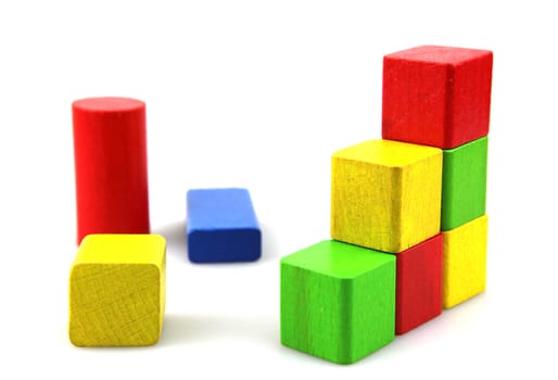 Wooden building blocks isolated on white background