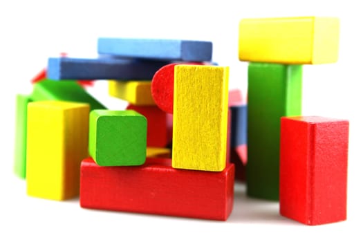 Wooden building blocks isolated on white background