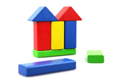Wooden building blocks isolated on white background
