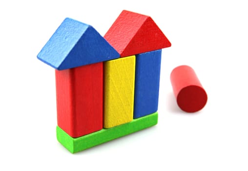 Wooden building blocks isolated on white background