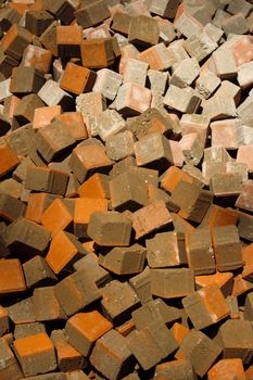 Stack of raw bricks texture