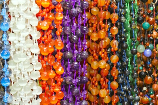 multi-colored chaplet of various sizes and shapes 