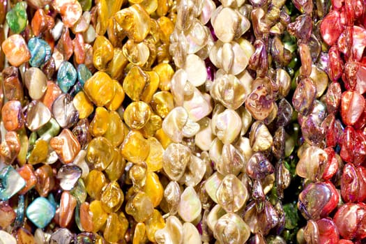 multi-colored chaplet of various sizes and shapes 