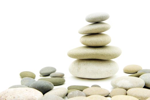 Stack of balanced stones on a white background