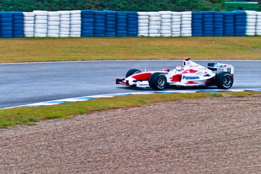 JEREZ DE LA FRONTERA, SPAIN - DEC 04: Jarno Trulli of Toyota F1 takes a curve during a training session on December 04, 2004, in Jerez de la Frontera, Spain