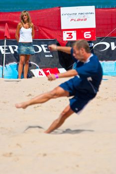 CADIZ, SPAIN -  JUL 30:  Unknown player of the team of Cadiz playing the Spanish Championship of Beach Soccer on Jul 30, 2005 on the beach of La Victoria in Cadiz, Spain
