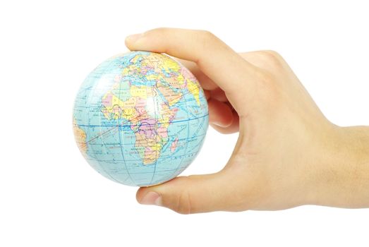Hand holdings a globe on a white