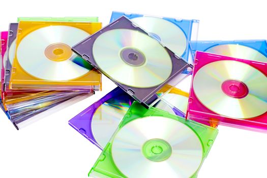 colorful CDs in boxes piled in a heap