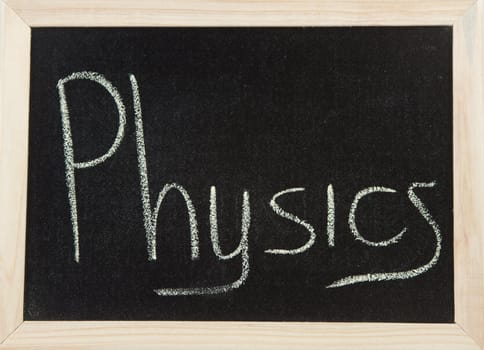 A black board with a wooden frame and the word 'PHYSICS' written in chalk.