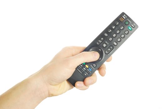 A hand holding a remote control isolated over a white background