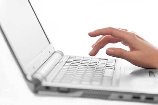 Close-up of typing female hands, selective focus