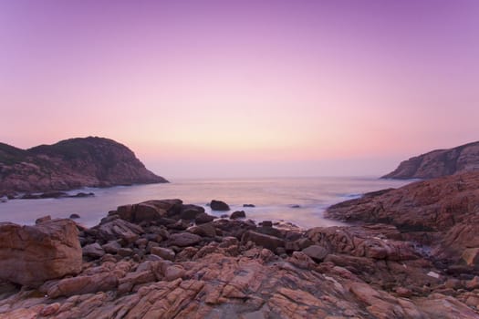 Sea rocks along the coast at sunrise 