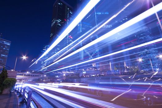 City traffic at night with light trails