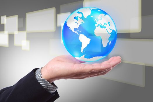 Business hand holding cystal globe on a touch screen background interface