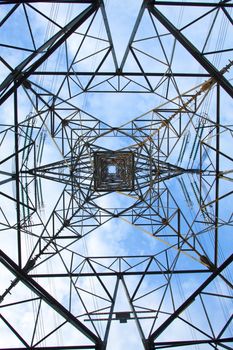 Electrical tower over a blue sky background