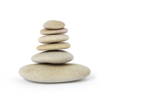 Stack of balanced stones on a white background