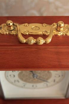 Antique luxury time clock close up.