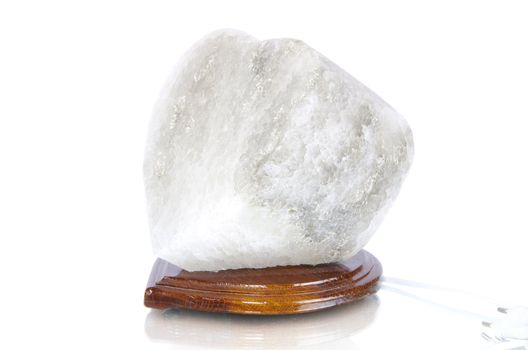 Salt rock lamp isolated over white background