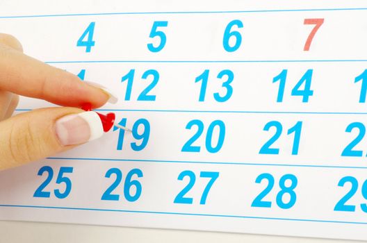 Red circle on a calendar concept for an important day