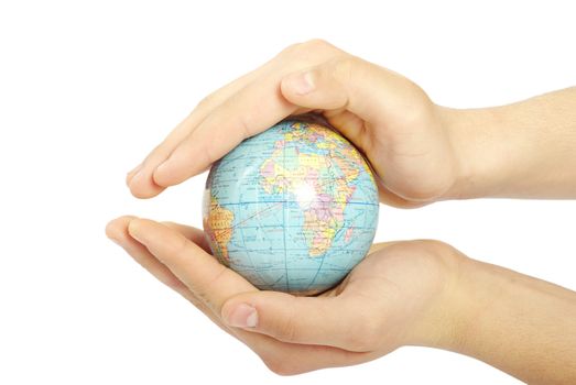 Hand holdings a globe on a white